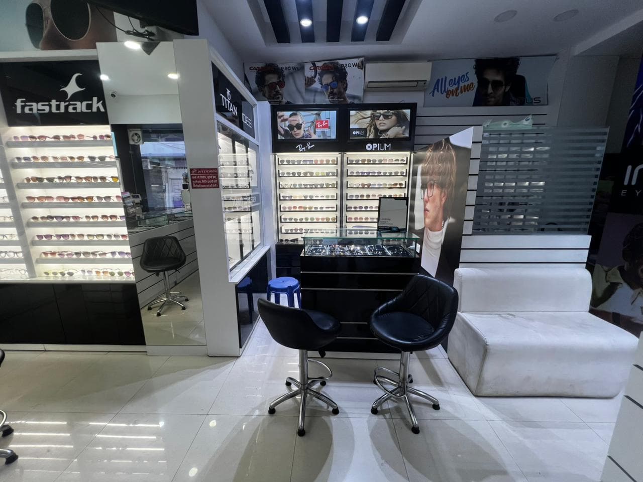 Seating area with Ray-Ban & Opium
